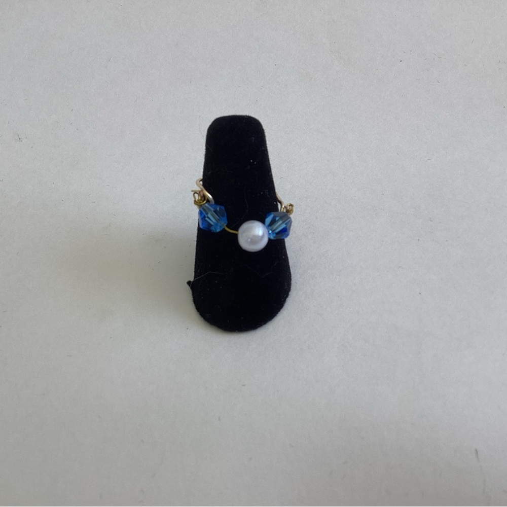 Gold Band Ring with Blue Crystal Accents and White Pearl